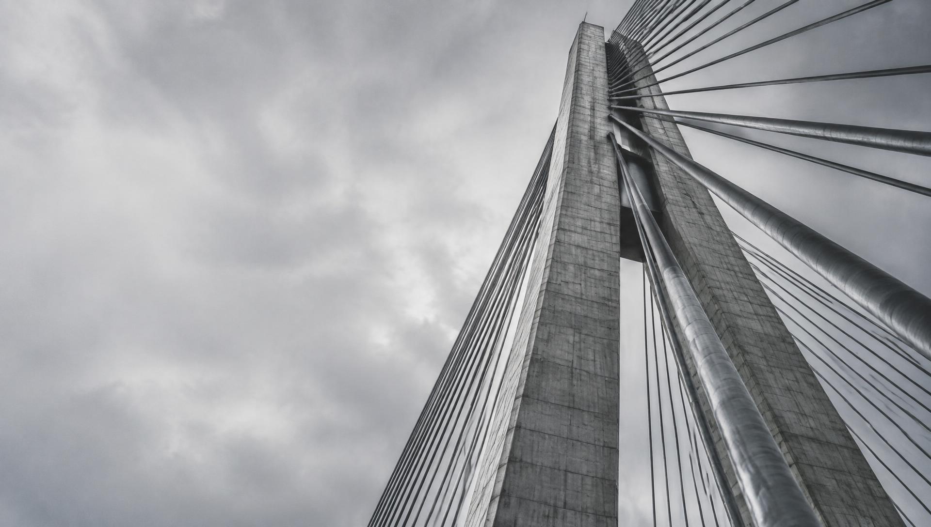 Cable-stayed bridge structure converging overhead